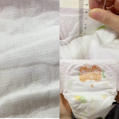 100%の綿の物質的で使い捨て可能な赤ん坊のおむつの柔らかい赤ん坊のズボン